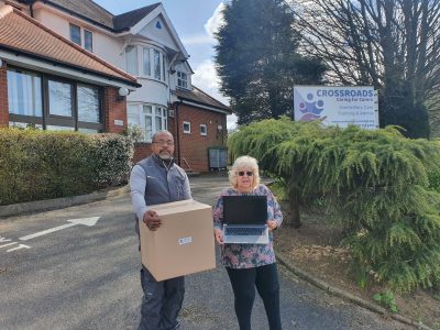Delivery of laptops to Crossroads