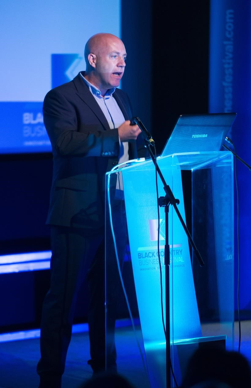 Corin Crane, chief executive of the Black Country Chamber of Commerce speaking behind a lectern