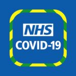 NHS Covid-19 logo on blue background.