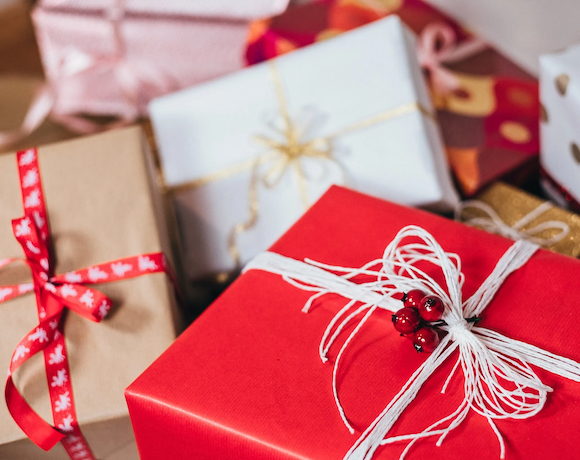 A haphazard pile of wrapped Christmas presents