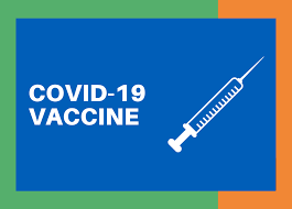 White text saying "Covid 19 Vaccine" on a blue background with a graphic of a hypodermic needle