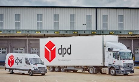 A DPD lorry and a DPD van parked infront of an industrial building.