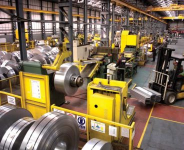 The factory floor of a large steel processing company.