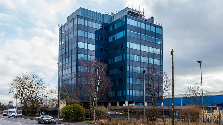 A ten storey office block with lots of windows called Intersection House