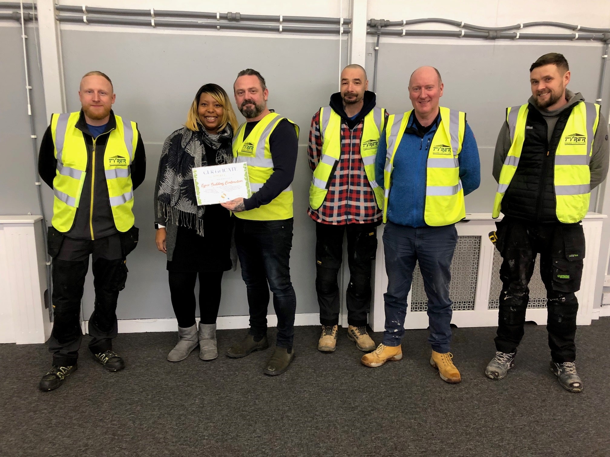 Tyrer Building Contractors get their certificate from Kelly Cranston