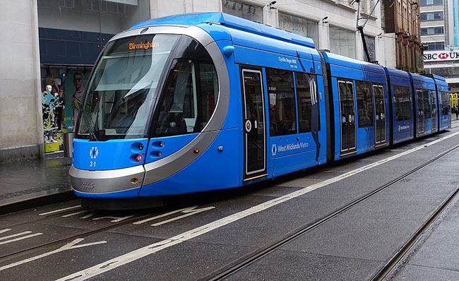 A blue Midlands Metro tram