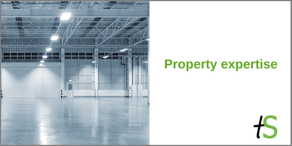 Property expertise banner with Think Sandwell logo and photo of shiny empty warehouse