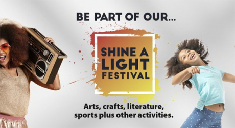 Shine a Light Festival logo with a woman on the left with a ghetto blaster on her shoulder and girl dancing on the right