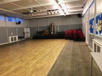 The worn and dirty carpet at St John's in Princes End, before Tyrer Building Contractors donated and fitted a new one