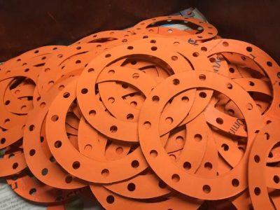 A pile of orange gaskets.