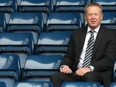 The chief executive of West Bromwich Albion, Mark Jenkins, sitting in the stands