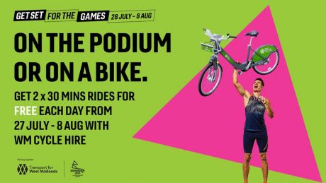 Poster for free cycle hire during the Commonwealth Games showing a photo of a person holding up a bike on a pink and green background